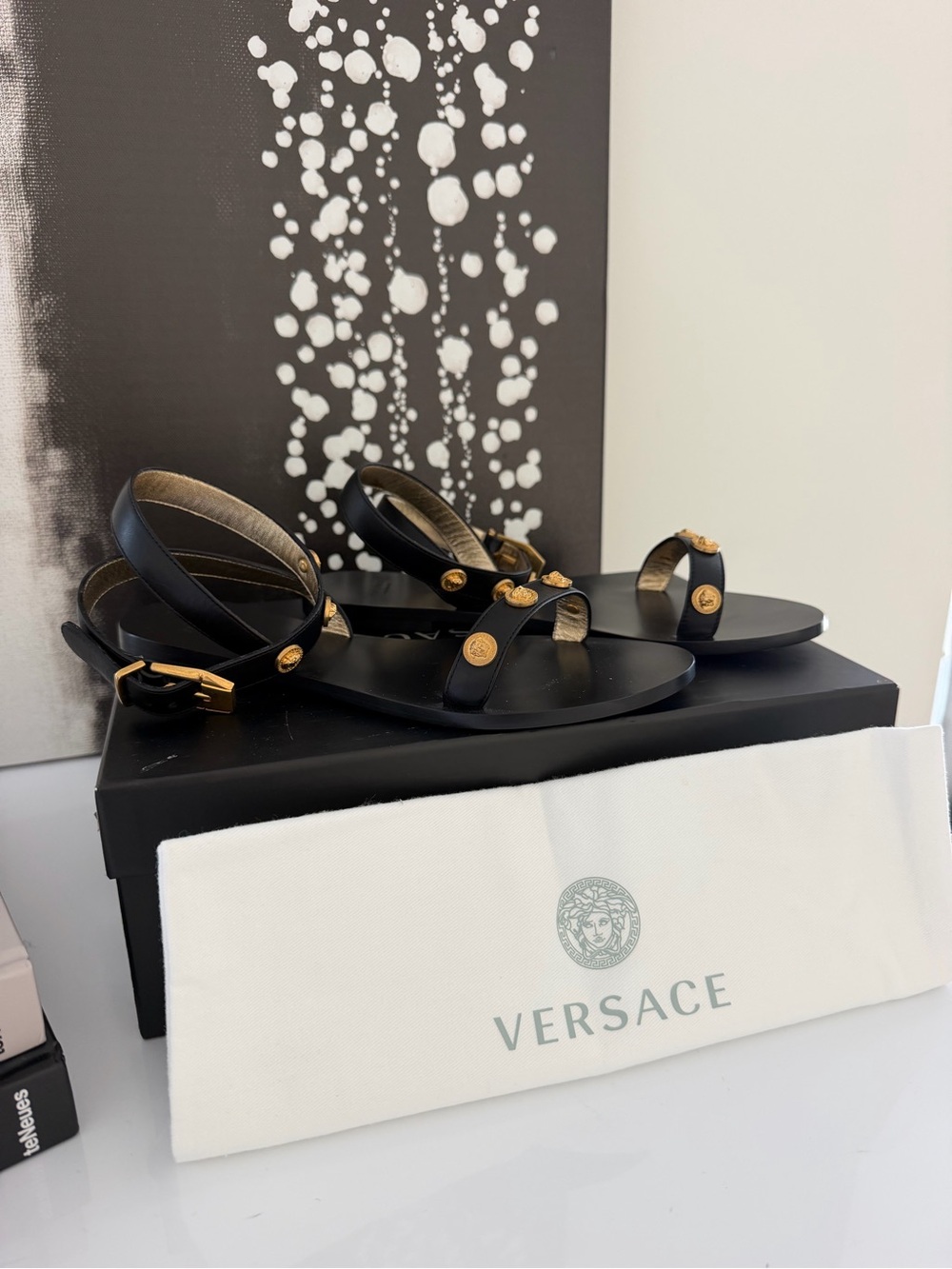 Versace Black Leather Sandals with Gold Medallion Accents